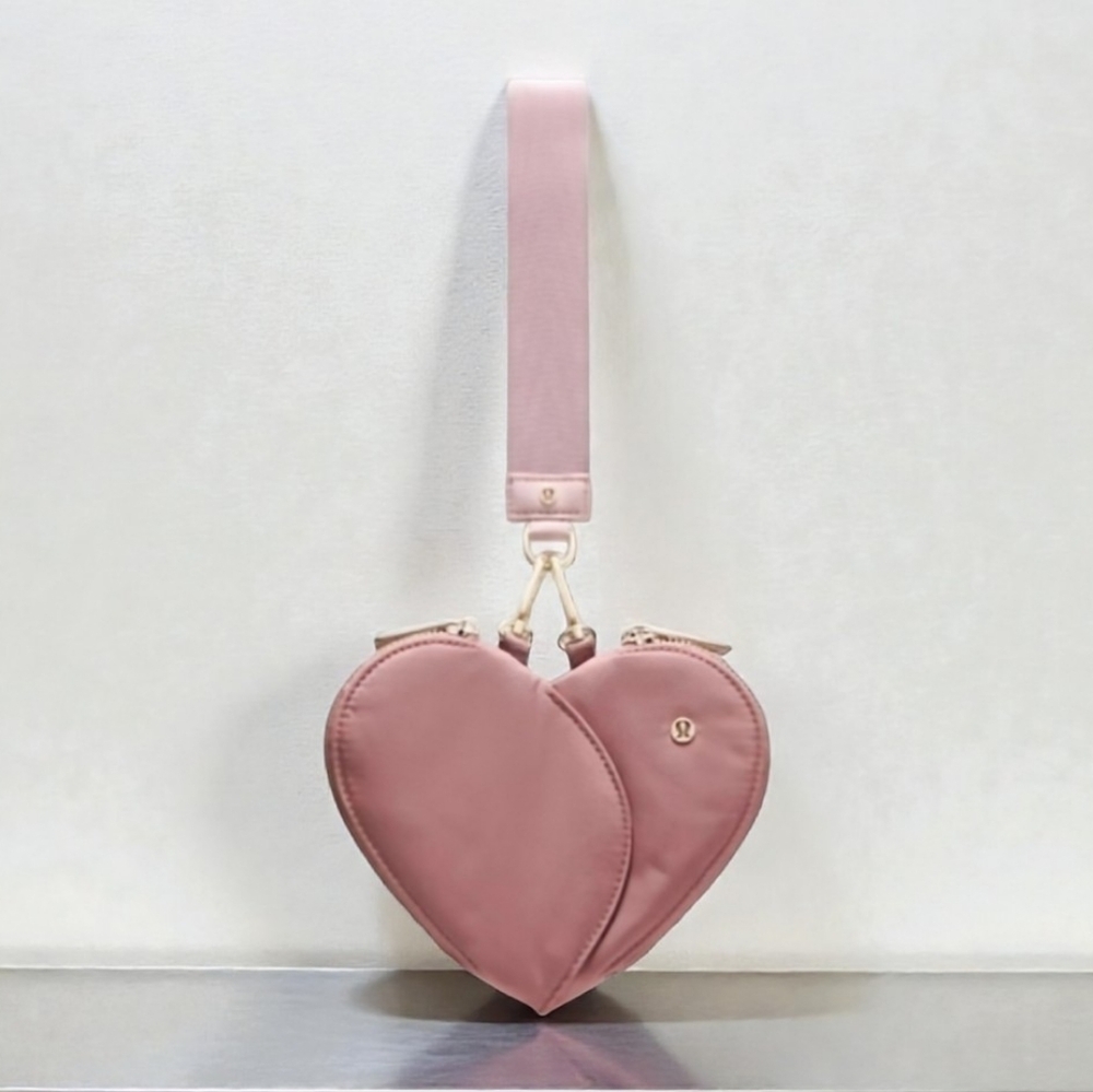 NEW Lululemon Dual Pouch Heart Wristlet in color Spiced Chai Pink Haze Gold